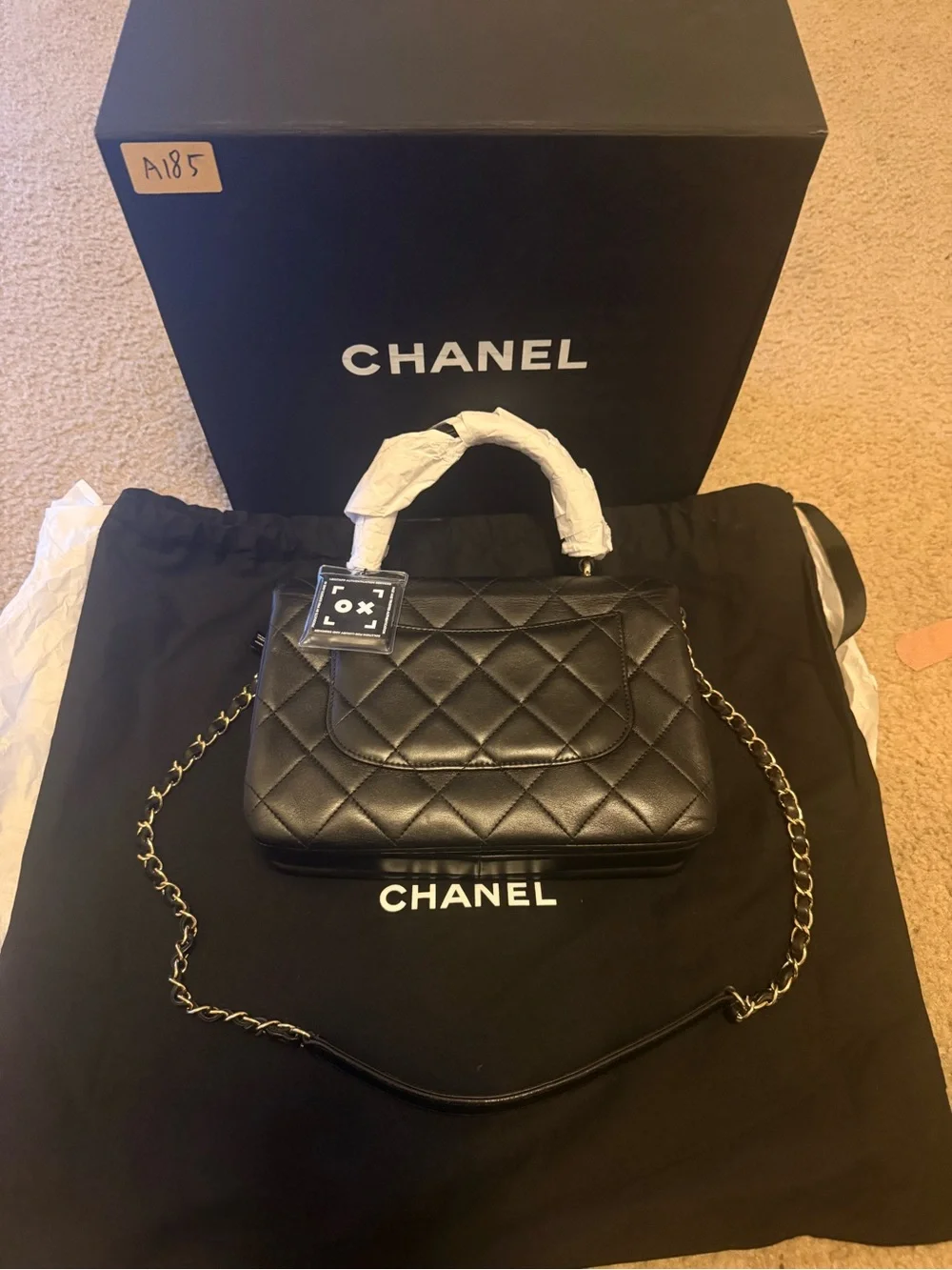 New CHANEL Black Quilted Leather Mini Top Handle Bag with Gold Hardware
